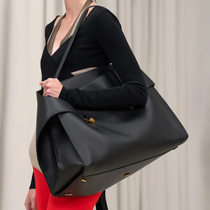 Nouveau sac à main en PU pour femmes, édition limitée, design élégant, grande capacité, polyvalent, sac à bandoulière, élégant, minimaliste, sac fourre-tout pour les voyages - Product Image 1