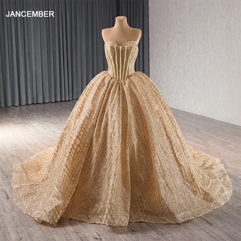 wedding dress made of gold Golden Gown Crafted with Shiny Lace and Gold Mirrors – Qëndresa main image 1