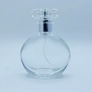 Botellas de Perfume de Vidrio Transparente de 30ml/70ml con Tapa de Plástico para Dispensar Fragancias, Frascos de Vidrio Redondos para Cuidado Personal - Product Image 1