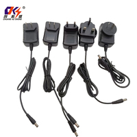 Alta calidad 3V 3A 9W fuente de alimentación montaje en pared Reino Unido enchufe AC DC adaptador con conector de 5,5*2,1mm para luces LED CCTV