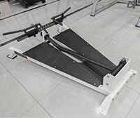 Machine à rames en T en acier robuste pour usage commercial - Inclinaison réglable, entraînement de force à charge de plaques pour le dos et les bras