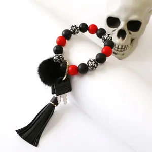 Cadeaux d'Halloween Porte-clés en perles de silicone Porte-clés en perles de pompon noir Bracelet Porte-clés porte-clés en silicone