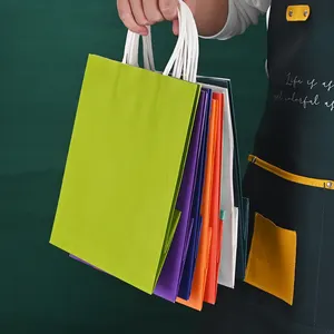 Vente en gros de sacs en papier kraft brun Sac cadeau en stock avec impression personnalisée Sac de restauration rapide à emporter avec poignée torsadée
