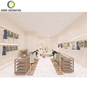 Diseño Moderno para Tienda de Bebés, Exhibidor de Ropa Metálico de Pared, Personalizable y Duradero, Muebles para Tienda de Ropa de Lujo - Product Image 4