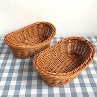 Op maat gemaakte groothandel goedkope voedselveilige handgeweven PP-wicker brood- en fruitmandje van plastic rotan voor thuisgebruik