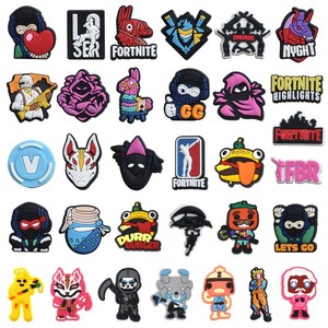 Boucles décoratives pour <span class=keywords><strong>chaussures</strong></span> en PVC souple de type <span class=keywords><strong>Crocs</strong></span>, avec 1 pompon en bois, pour la personnalisation de <span class=keywords><strong>chaussures</strong></span> et bracelets, en stock pour la vente en gros - Product Image 1