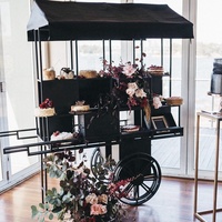 Voiture de bonbons pliable en métal personnalisée Chariots de bonbons à fleurs Chariot de bar à bonbons pour dessert avec roues pour la décoration d'événement de mariage