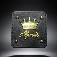 Étiquette en métal avec logo en relief en cuir PU personnalisé pour vêtements, jeans