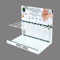 Support d'affichage de crème pour les mains en acrylique et métal personnalisé moderne APEX pour les magasins de détail