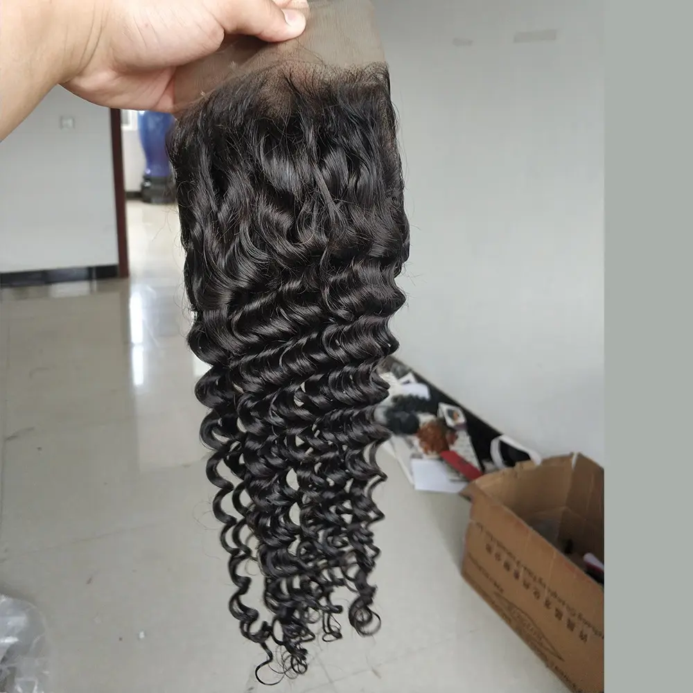 Venta al por mayor 8A Deep Curly 13*4 HD Cierre frontal de encaje transparente Paquetes súper delgados frontales de encaje suizo