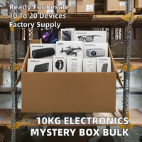 Boîte mystère électronique en gros pour la revente : Stock en vrac de téléphones portables, tablettes, écouteurs, accessoires d'appareil photo