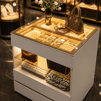 Cremefarbener, umweltfreundlicher, langlebiger Schmuck-Präsentationswürfel mit LED-Glasplatte, offener Inselregal-Organizer, Thekenvitrine mit zwei Schubladen