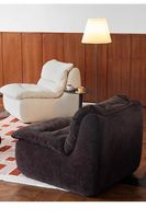 Fauteuil moderne en tissu vert avec dossier et assise rembourrés, canapé-lit une place, design capitonné pour salon