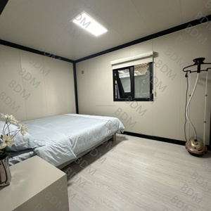 Bungalow préfabriqué extensible de 40 pieds avec structure <span class=keywords><strong>en</strong></span> acier, <span class=keywords><strong>chalet</strong></span> <span class=keywords><strong>en</strong></span> <span class=keywords><strong>bois</strong></span> pour usage bureautique, fabriqué à partir de panneaux sandwich - Product Image 5