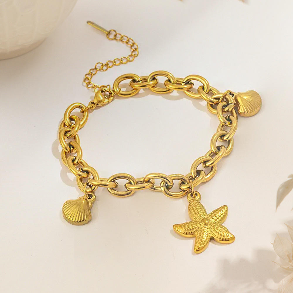 0019 สร้อยข้อมือเปลือกหอยปลาดาวสีทอง