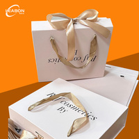 Boîte en papier de luxe avec fermeture magnétique à ruban, revêtement UV, gaufrage pour bague, boucles d'oreilles, collier, montre, bijoux, emballage cadeau haut de gamme