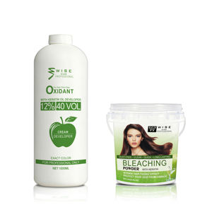 Le lait <span class=keywords><strong>de</strong></span> peroxyde oxydant d'hydrogène et la poudre <span class=keywords><strong>de</strong></span> blanchiment des cheveux contiennent un <span class=keywords><strong>extrait</strong></span> <span class=keywords><strong>de</strong></span> plante pour rendre la couleur des cheveux claire pour la teinture permanente des cheveux - Product Image 1
