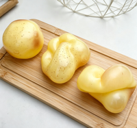 Balle anti-stress mignonne en forme de pomme de terre de 6 cm, en TPR, remplie d'huile de coco, déformable, sans rebond, jouet sensoriel à presser