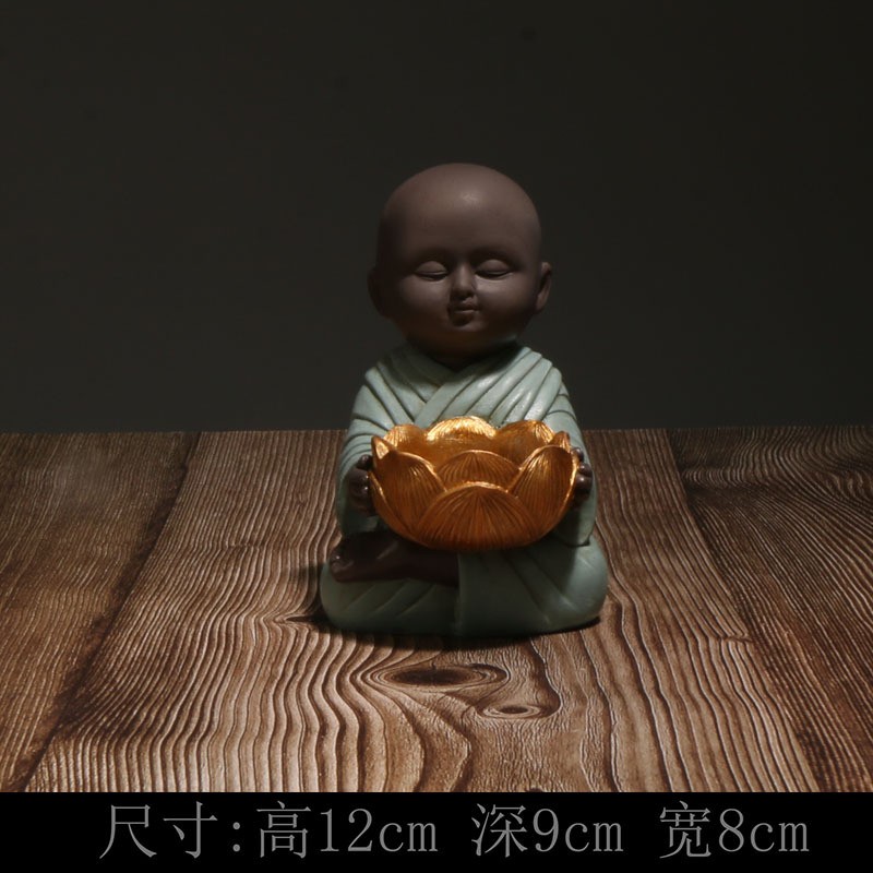Little monk holding lotus candlestick-blue