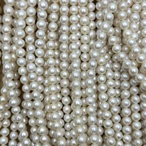 Brin de perles d'eau douce naturelles rondes AA 7-7.5mm en gros, bon lustre, légère tache, pas de forme de pomme de terre, pas de bande terne