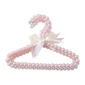 Cintres en plastique PET <span class=keywords><strong>bebe</strong></span> Cintres en plastique avec nœud en fausse perle Cintres en plastique pour enfants pour magasin de vêtements Chiens Chats - Product Image 1