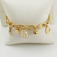 Bracelet trèfle à quatre feuilles en acier inoxydable or 18 carats à double couche inspiré de l'Europe et de l'Amérique Bracelet de mode pour femmes