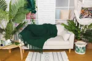 Commercio all'ingrosso di lusso in acrilico verde ordito per maglieria divano letto divano coperta decorativa con nappe