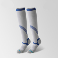 Chaussettes de sport de compression professionnelles pour la longue durée des entraînements, avec semelle épaisse en tissu éponge