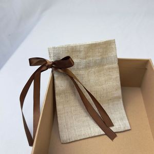 Wholesale Cheap Small Jute <b>Drawstring</b> Gift <b>Pouch</b> Customized Eco-friendly Packaging <b>Pouch</b> Bag Jute Fabric Bag With Silk Ribbon - Product Image 1