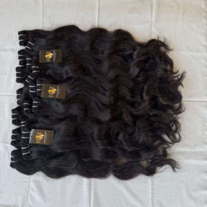 Venta al por mayor de cabello humano virgen indio de alta calidad, extensiones de cabello humano virgen indio liso y ondulado, proveedores de extensiones de cabello humano de templo indio. - Product Image 1