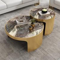 Table basse moderne en marbre blanc pour la décoration intérieure avec cercle en acier inoxydable et plateau rond doré Meubles mobiles en pierre