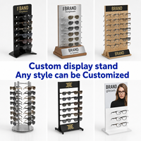 Support de présentation de lunettes de luxe personnalisé avec logo pour magasin de vente au détail de lunettes de soleil avec solution LED sur mesure