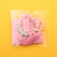 Vente chaude Silicone Perle Bracelet Pu En Cuir Gland Sac À Main Porte-clés pour Bracelet Bracelet En Bois Id Carte De Crédit Portefeuille Porte-clés