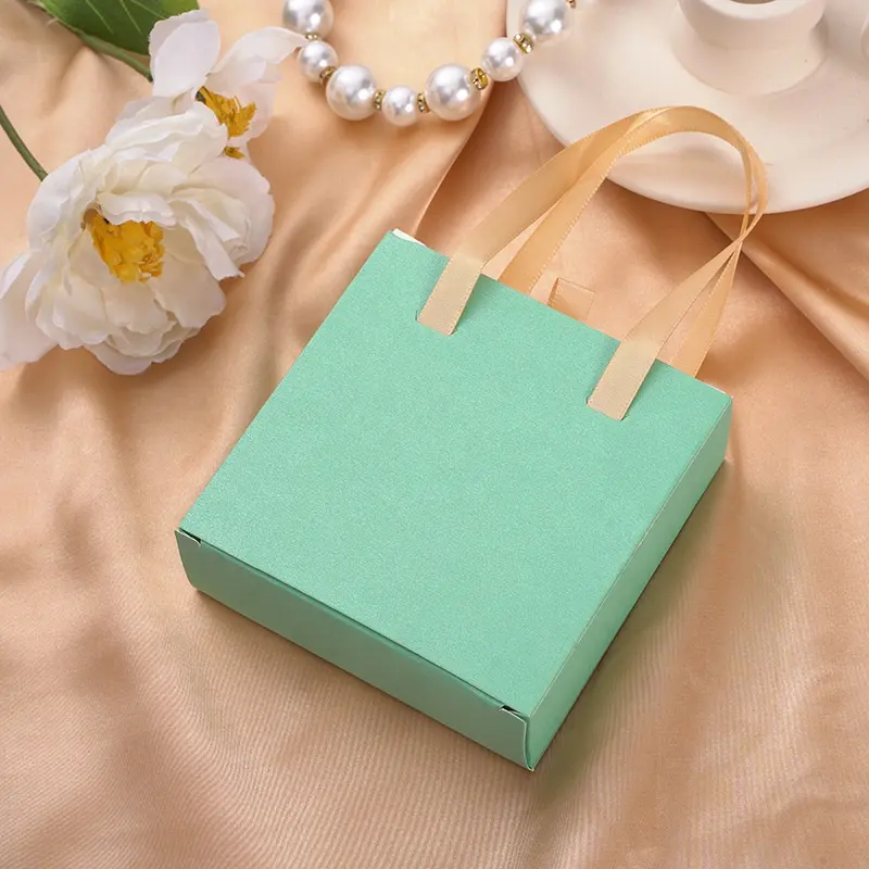 Joyero portátil de celebridad con logotipo, cajón de lujo, joyero, caja de regalo de papel de cartón con asa