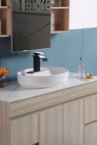 Fregadero de cerámica de lavabo de arte ovalado moderno encimera al por mayor PARA USO HOTELERO diseño novedoso en blanco para hoteles - Product Image 2