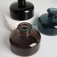 Nouvel arrivage Bouteille décorative ronde en verre diffuseur Bouteille d'aromathérapie roseau Conteneur d'huiles essentielles Bouteilles en verre bocaux diffuseur