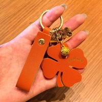 Porte-bonheur en cuir trèfle à quatre feuilles pour voiture et sac