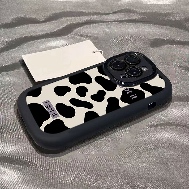 Coquille bouffante - motif vache noir et blanc sur fond noir