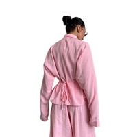 Nouvel ensemble deux pièces élégant pour femme 2026 : blazer rose uni et pantalon long avec laçage à la taille, idéal toutes saisons