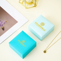 Coffret Cadeau de Bijoux A1 Aqua Turquoise avec Couvertures Imprimées Or, Intérieurs Lumineux, Présentoir pour Collier, Boucles d'Oreilles, Bague et Emballage