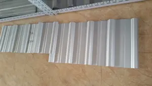 Máquina para fabricar tejas de techo completamente automática de alta velocidad Máquina formadora de rollos de costura permanente para láminas de techo