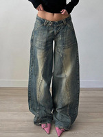Jean large vintage délavé en denim déchiré avec double bouton et poches plaquées, coupe décontractée ample et décontractée