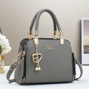 Hot-selling 2026 <strong>Pearl</strong> Solid Color Elegant Fashion Shoulder Crossbody Bags Luxury Women's <strong>Handbags</strong> - Product Image 3