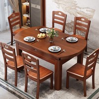 Table à manger ronde rétractable moderne en bois massif 6 places, imperméable et durable, design contemporain pour usage hôtelier