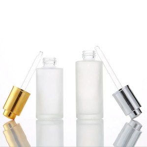 30 ml rõ ràng <span class=keywords><strong>Frosted</strong></span> Báo Chí sang trọng <span class=keywords><strong>push</strong></span> <span class=keywords><strong>button</strong></span> Vàng Pipette tinh dầu chai thủy tinh với vàng bạc Top - Product Image 3