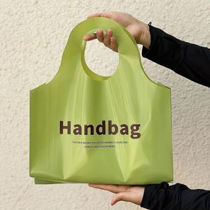 Customized Printed Fold Plastic pink Thank You Die Cut Handle Carry Shopping Packaging Bags for Boutique Retail Shopping - Product Image 1