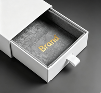 Boîte à bagues rigide de luxe recyclable faite à la main pour bijoux, emballage gaufré blanc avec fentes, rubans, modèle en papier ondulé JREL003
