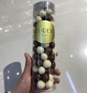 Caramelle Solide Ripiene di Cioccolato al Gusto Pesca Bianca 148g, Prezzo Conveniente all'Ingrosso - Product Image 1