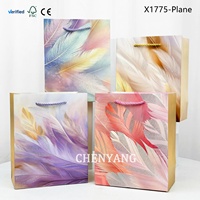 Sacs de courses en papier de haute qualité, entièrement recyclables, avec gaufrage, nœud doré, motif bouquet, pour boutiques, vente en gros et estampage