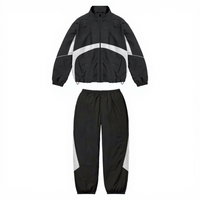 Ensemble de survêtement d'hiver personnalisé à rayures noires et blanches 100% polyester à séchage rapide pour hommes, avec logo frontal, fabricant OEM/ODM